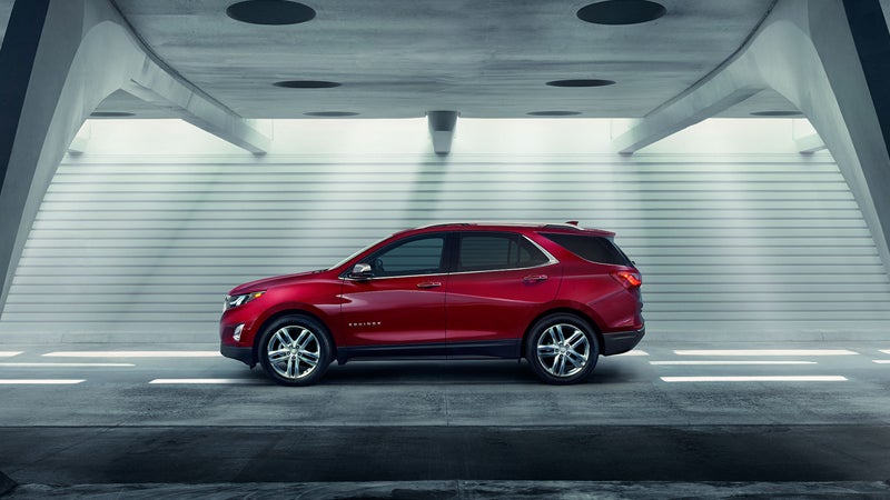 Red 2018 Chevy Equinox in tunnel