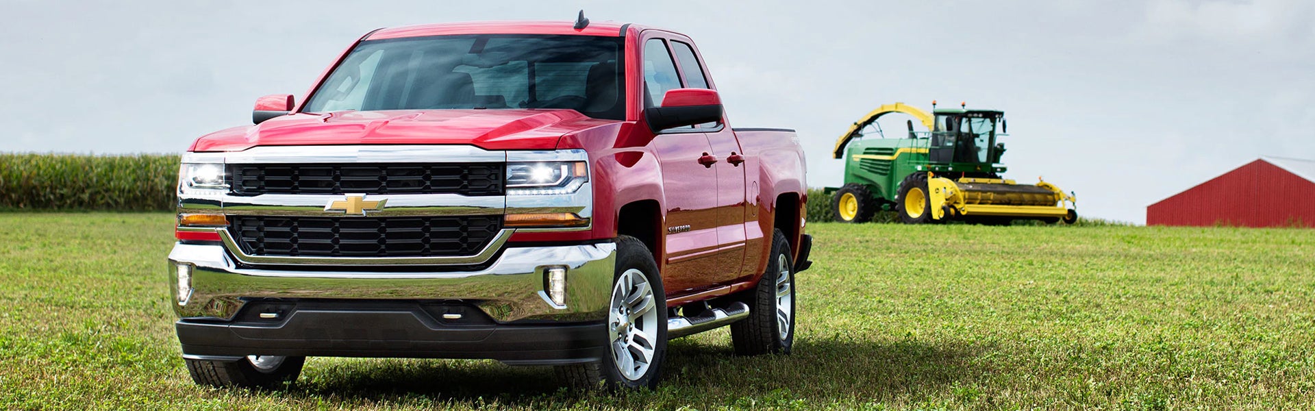 Red 2018 Chevy Silverado on farm