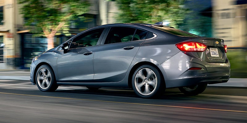 Silver 2019 Chevy Cruze driving