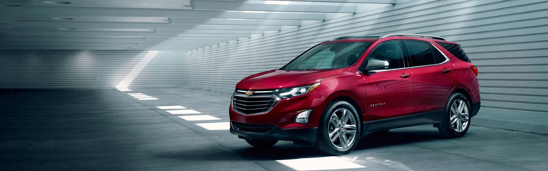 Red 2019 Chevy Equinox in tunnel
