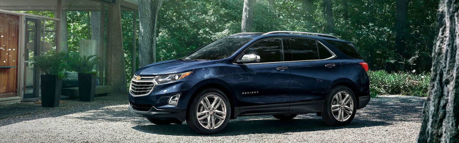 Blue 2021 Chevy Equinox in forest
