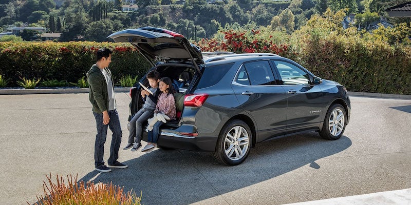 Family sitting in the back of a 2021 Chevy Equinox