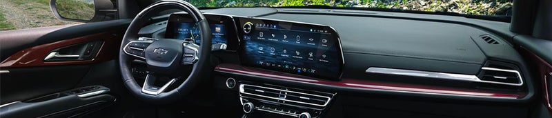 Chevrolet Traverse interior design of a steering wheel and center console